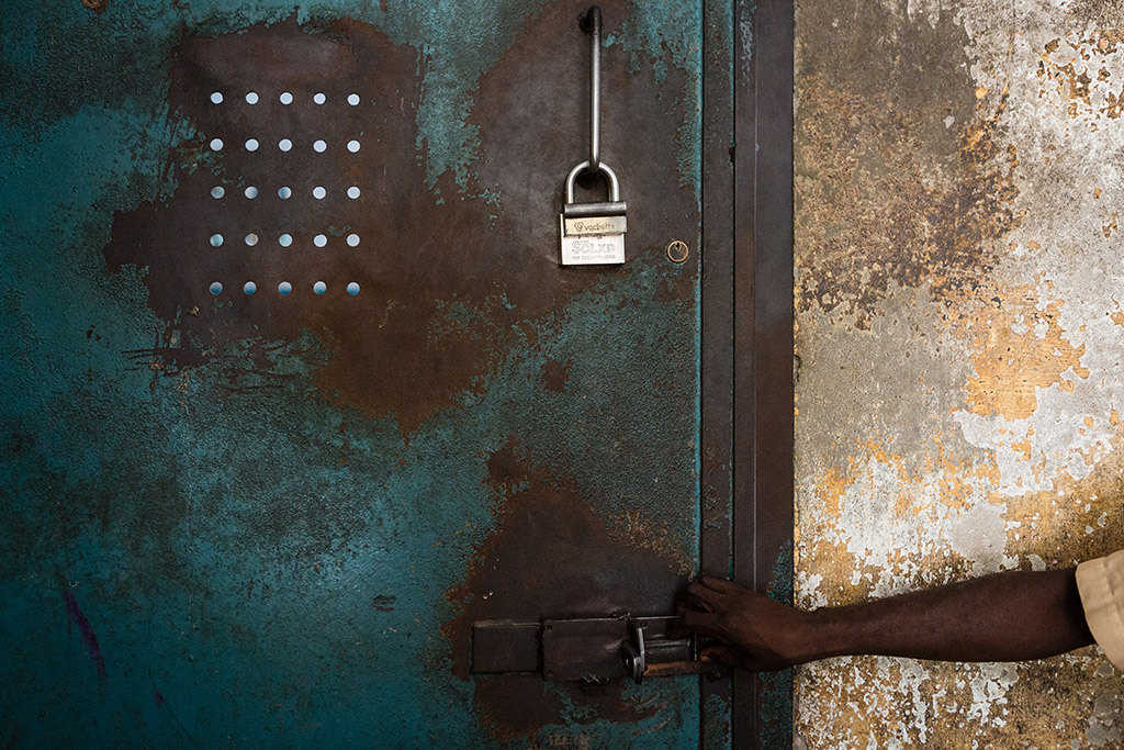 hand locking prison door